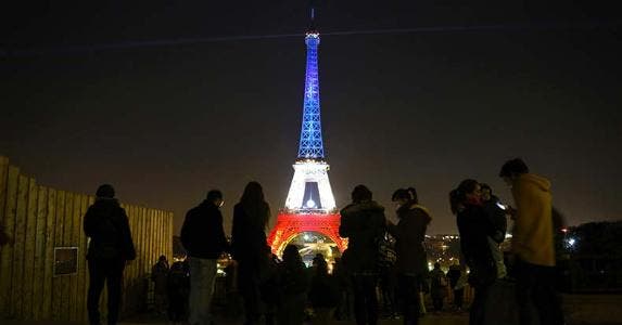 1 in 9 less likely to buy stocks after terrorism Eiffel Tower's tribute after France attacks | LUDOVIC MARIN/AFP/Getty Images
