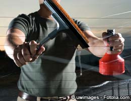 Laid-off banker becomes window cleaner