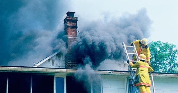 Firefighters putting out a house that's on fire