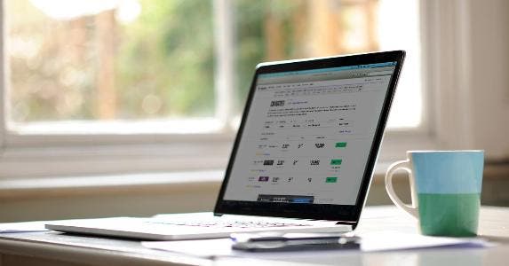 Can you really make money with a CD ladder? Photo of Bankrate's CD rate table on a laptop screen | Photo illustration by Bankrate. Photo by Johnnie Davis/Moment/Getty Images
