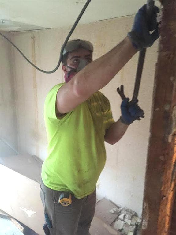 Michael Zonin completes demo work on a house Michael Zonin completes demo work on a house | Photo courtesy of Marc Aschoff