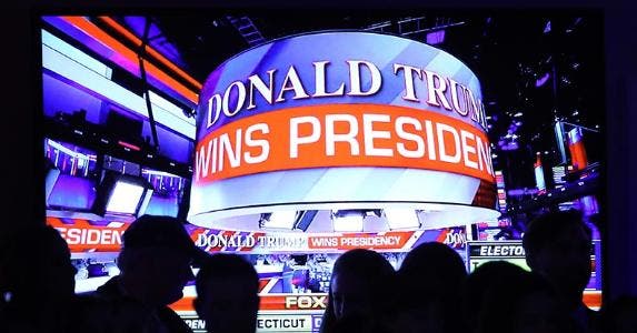 Global economy: Winner or loser with Trump? 'Donald Trump wins presidency' ticker | Mark Wilson/Getty Images