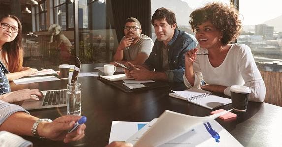 5 things you must know about 401(k)s Happy man leaning back in chair © g-stockstudio/Shutterstock.comCoworkers chatting at table © Jacob Lund/Shutterstock.com