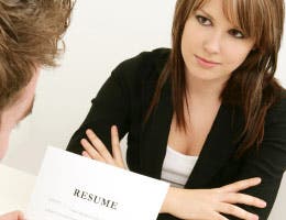 Woman's resume being reviewed