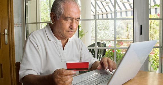 Seniors are at risk using debit cards © cunaplus/Shutterstock.com
