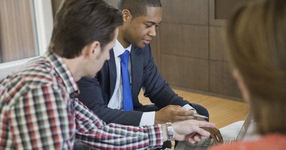 3 ID theft questions for an investment adviser Adviser meeting with young couple | Hero Images/Getty Images