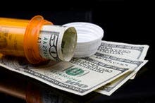 Prescription pill bottle and money