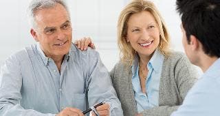 Couple with adviser © Rido/Shutterstock.com