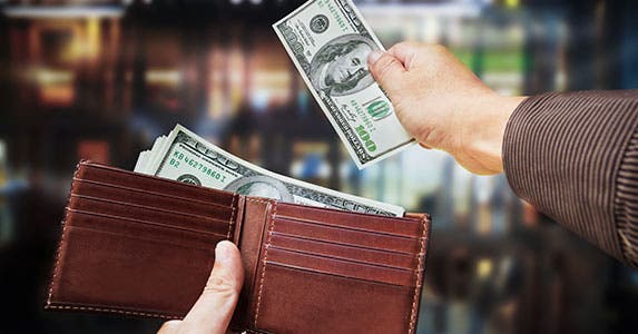 Spend more than you earn © cowardlion/Shutterstock.com