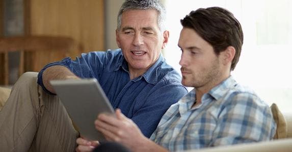 Unusual ways lenders measure creditworthiness Adult son and father browsing tablet computer | Richard Drury/DigitalVision/Getty images