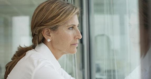 Is my money safe after foreclosure? Serious woman looking out of window | PhotoAlto/Antoine Arraou/Getty Images