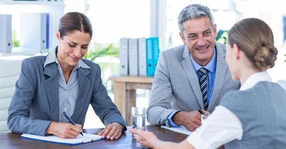 How to complain about your bank Woman meeting two advisers © wavebreakmedia/Shutterstock.com