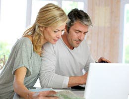 Questions to ask before refinancing a vacation home © Goodluz/Shutterstock.com