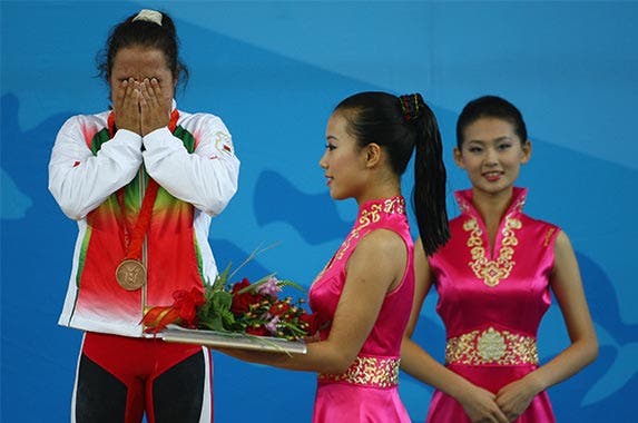 Medals presenter Medals presenter | Mike Hewitt/Getty Images