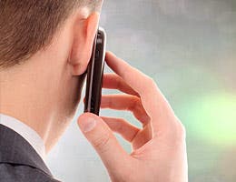 Answer your phone while on the interview © maradonna 8888/Shutterstock.com
