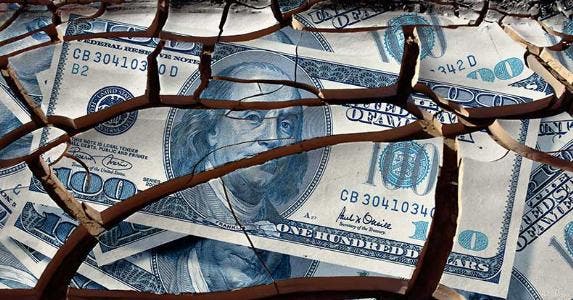 What will inflation cost you in 2016? Cracked $100 dollar bill © iStock