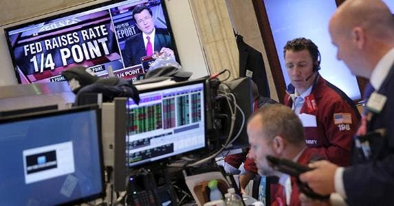 Is the Fed ready to keep the rate hikes coming? Traders work on the floor of the NYSE after the Federal Reserve raised interest rates © LUCAS JACKSON/Reuters/Corbis