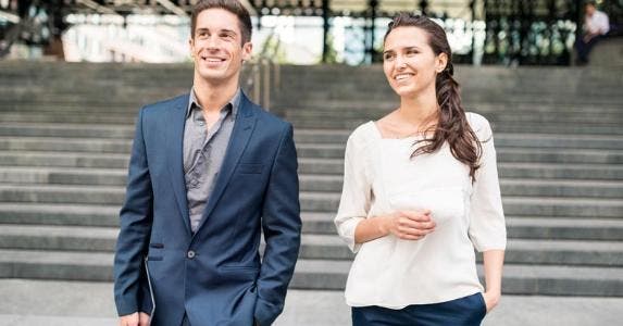 How to find the right personal loan for you Two colleagues walking outside together | Ben Pipe Photography/Cultura/Getty Images
