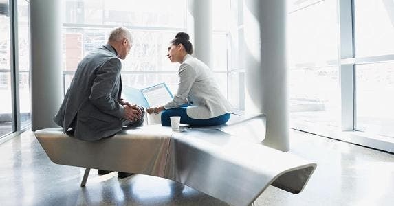 What money market changes mean for investors Coworkers meeting at open office bench | Hero Images/Getty Images