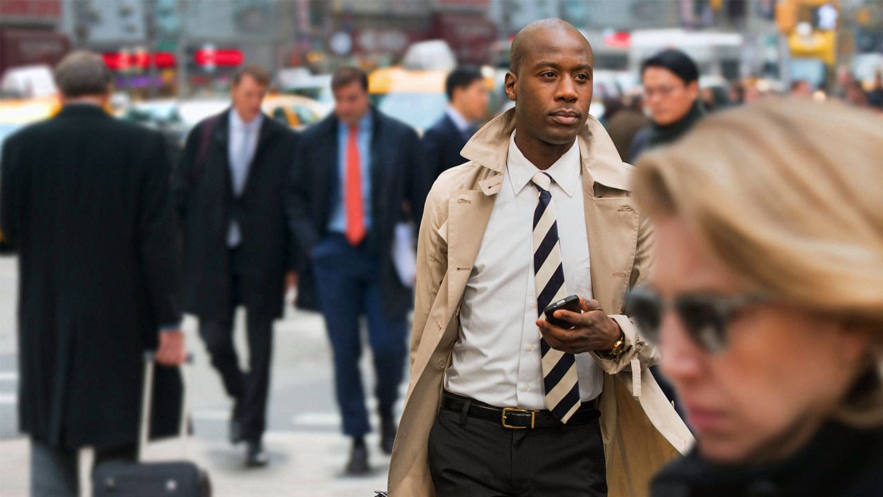 People in city walking to work