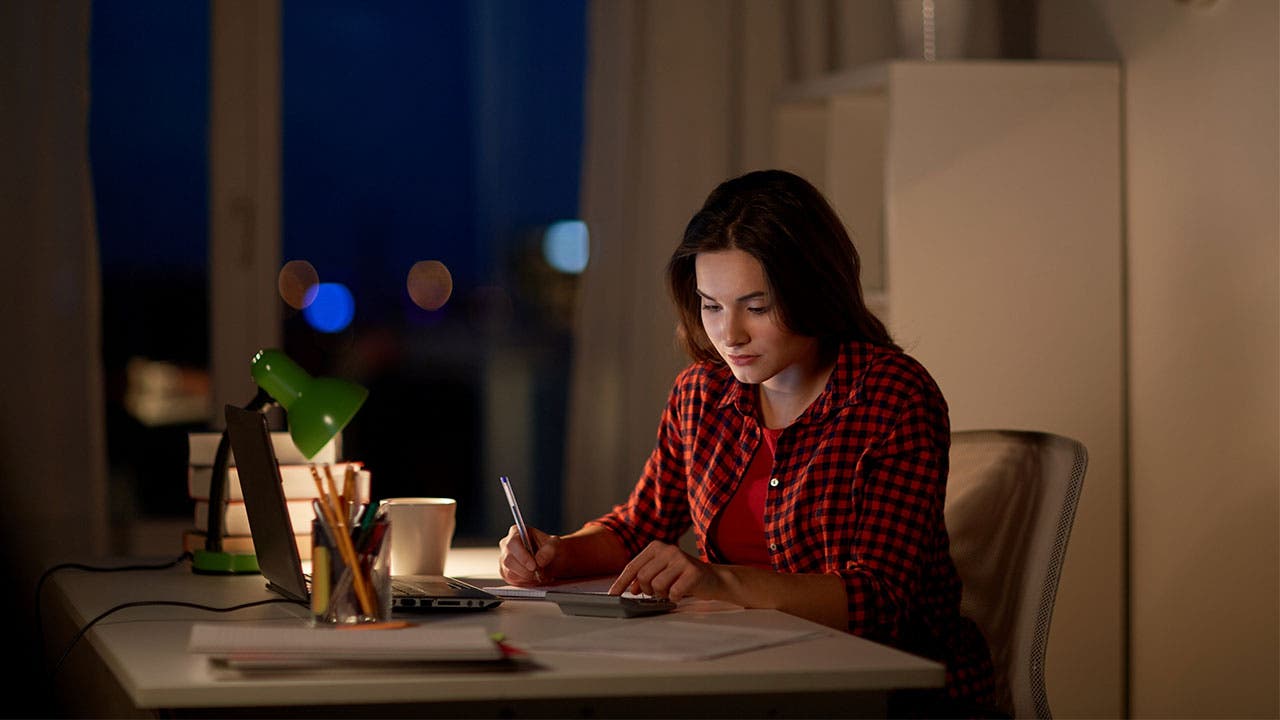 Woman works from home office