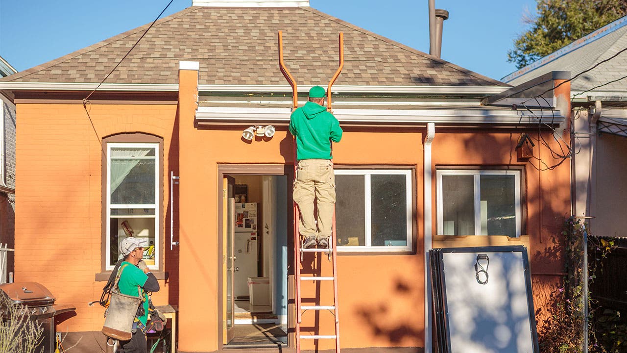 Crew working on house
