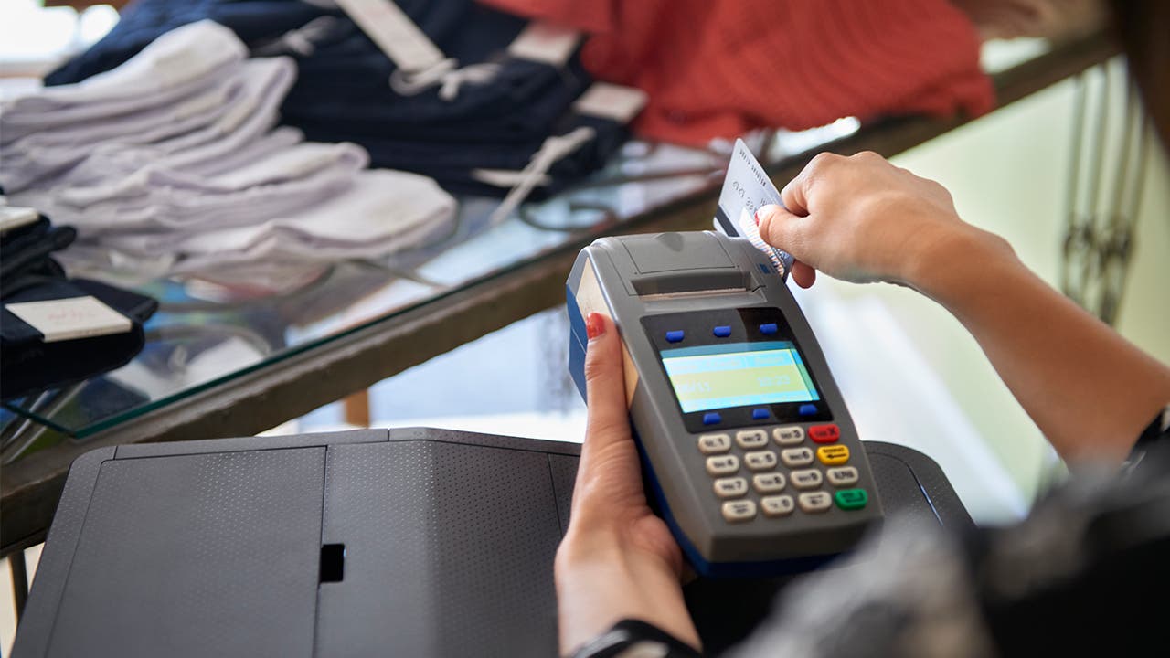 Woman using credit card