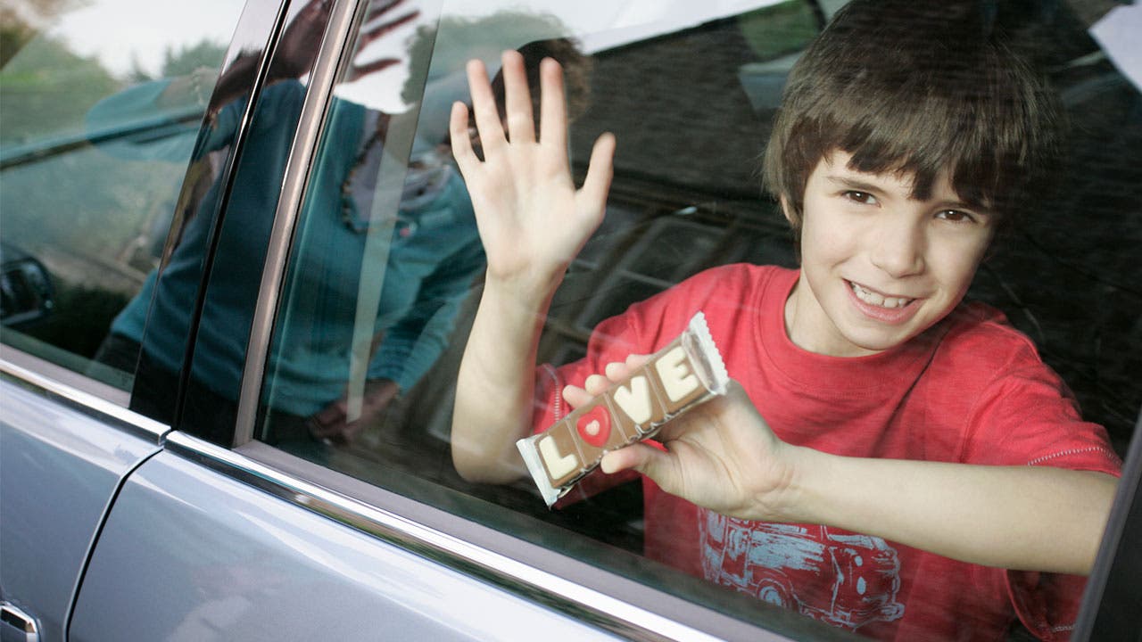 Kid with candy bar