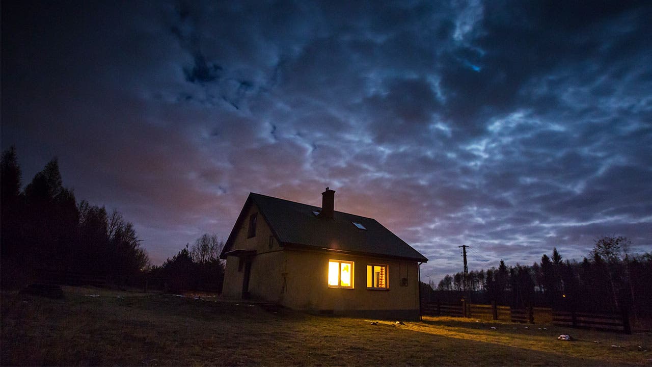 House with gloomy sky