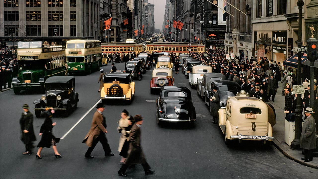 Cars and people in 1930s New York