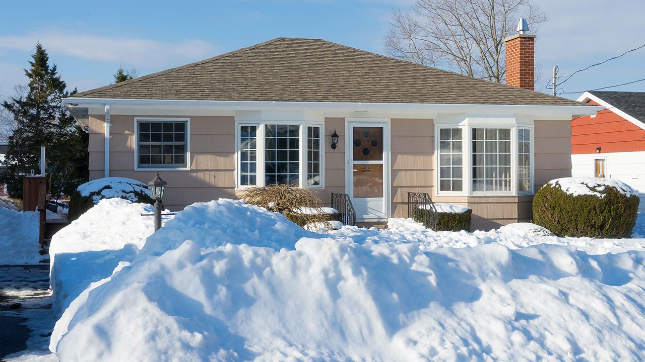 House in winter snow