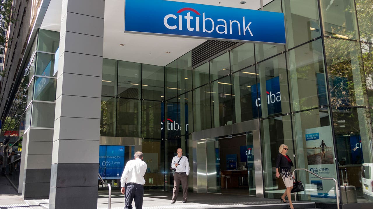 People walking out of Citibank