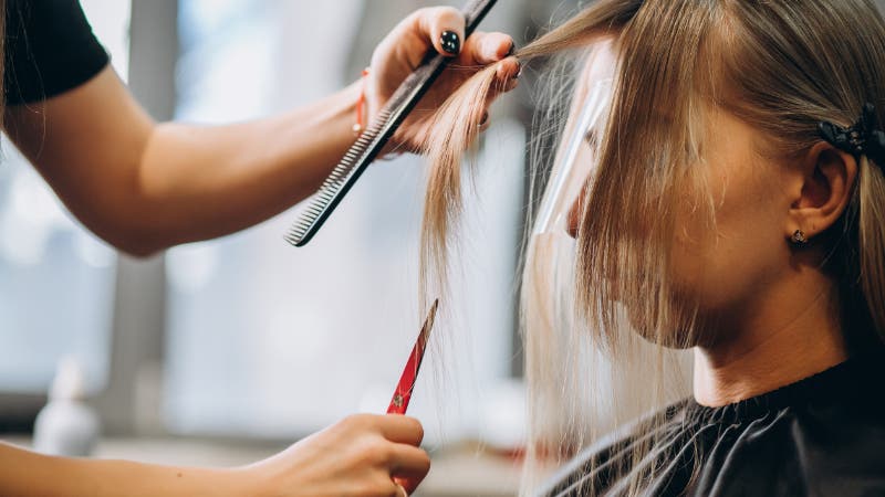 woman cutting hair