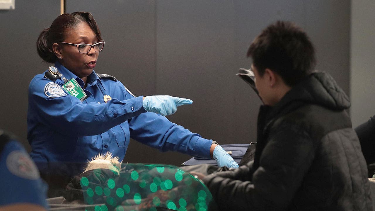 TSA agent in O'Hare Airport