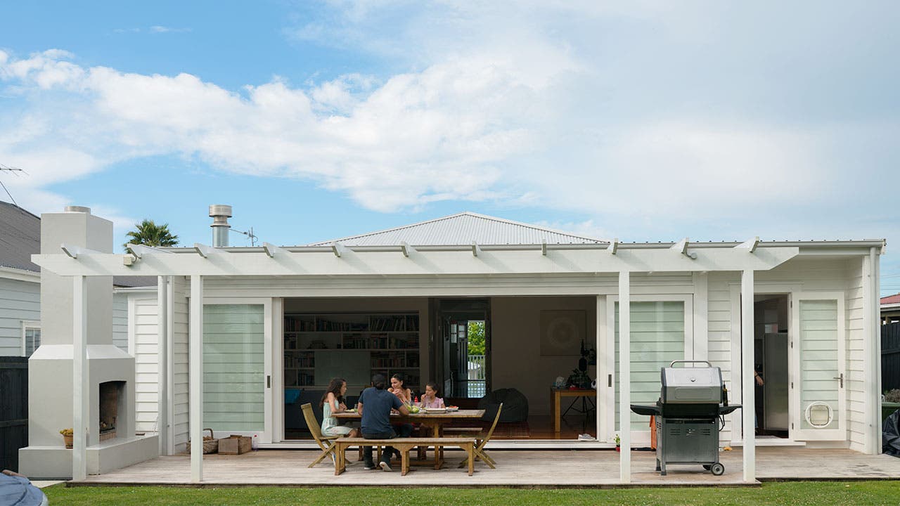 Family eating on outside patio