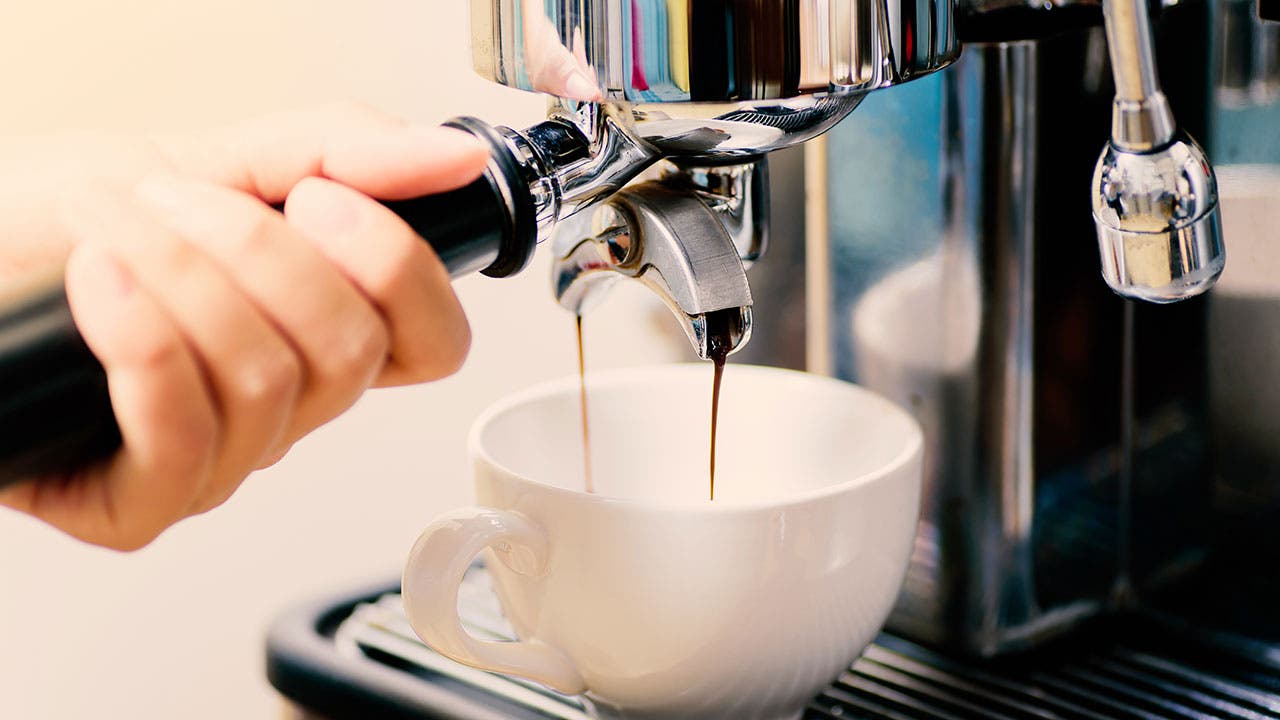 Woman pouring coffee