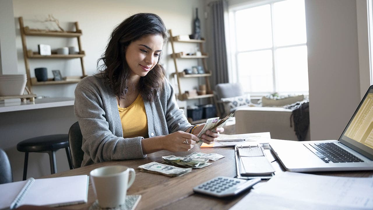 Woman counting money