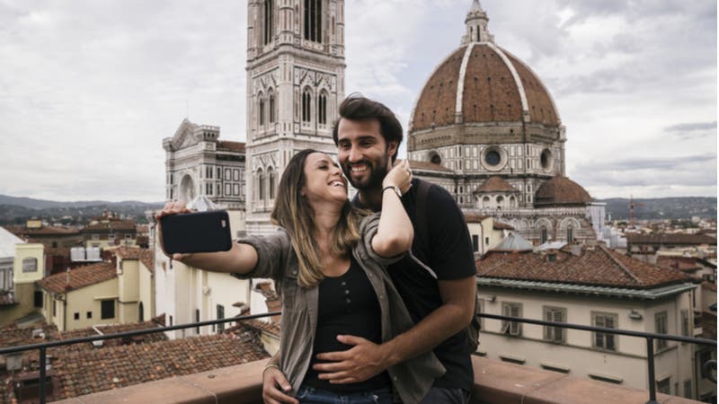 Young couple takes selfie while on vacation