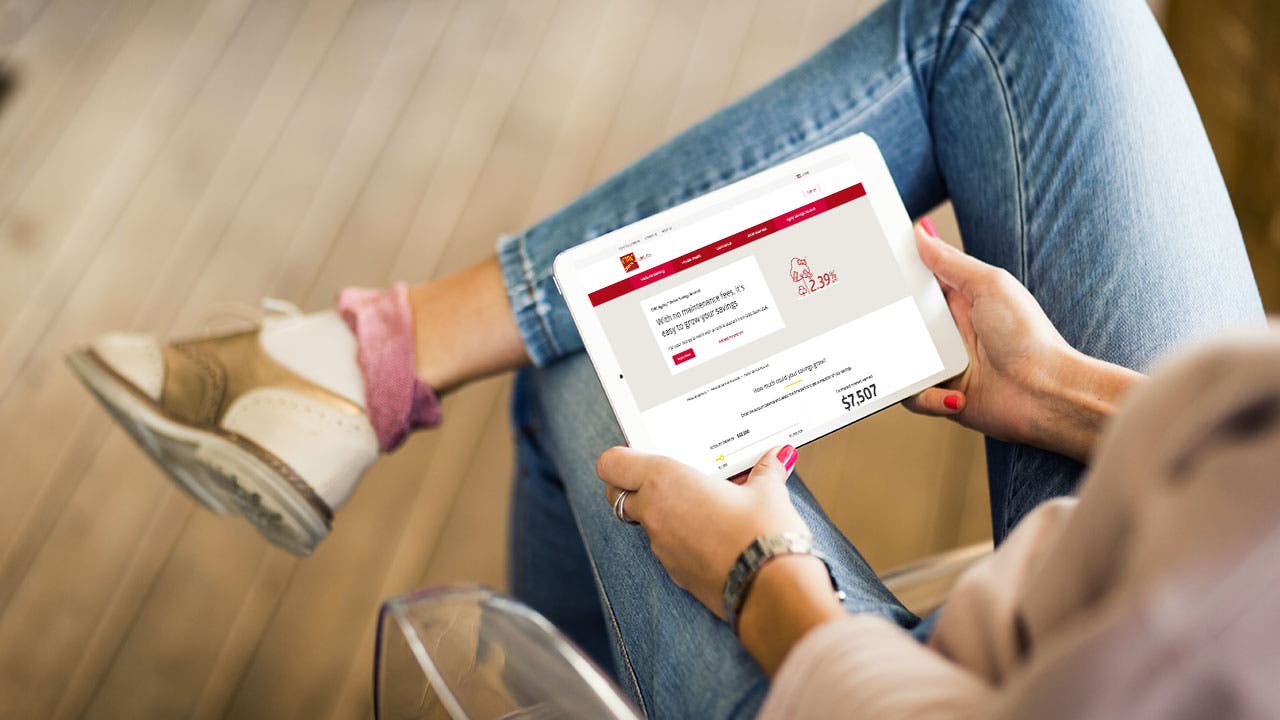 Woman using tablet for banking