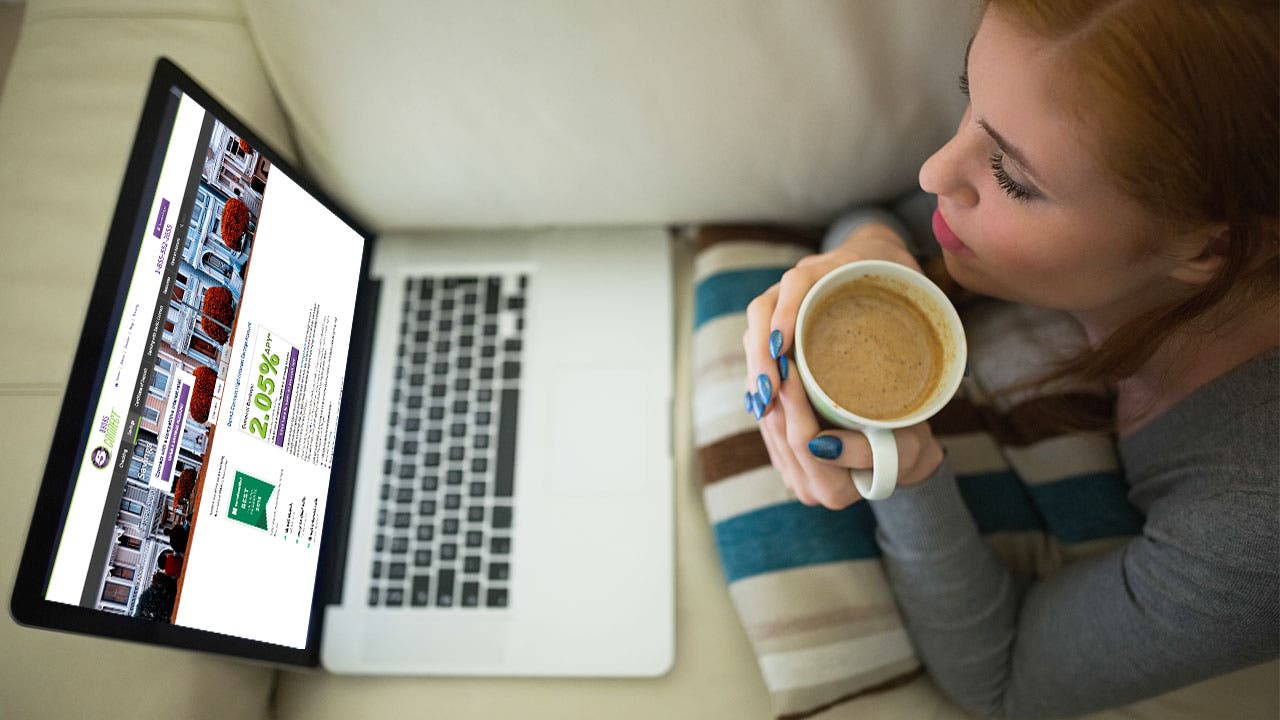 Woman looking at Bank5 Connect website on laptop