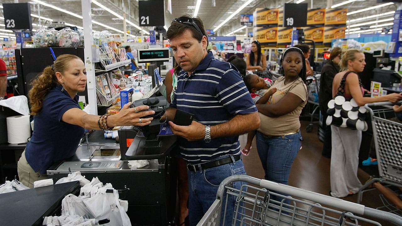Man checks out at Walmart