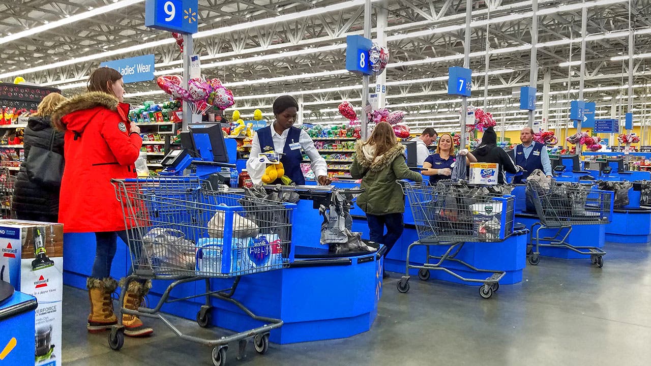 Woman checking out at Walmart
