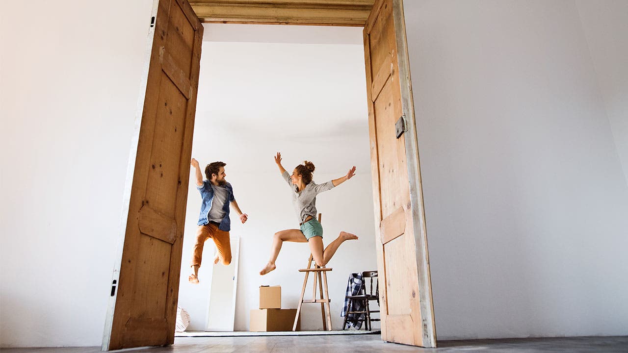 Millennials jumping after moving into apartment