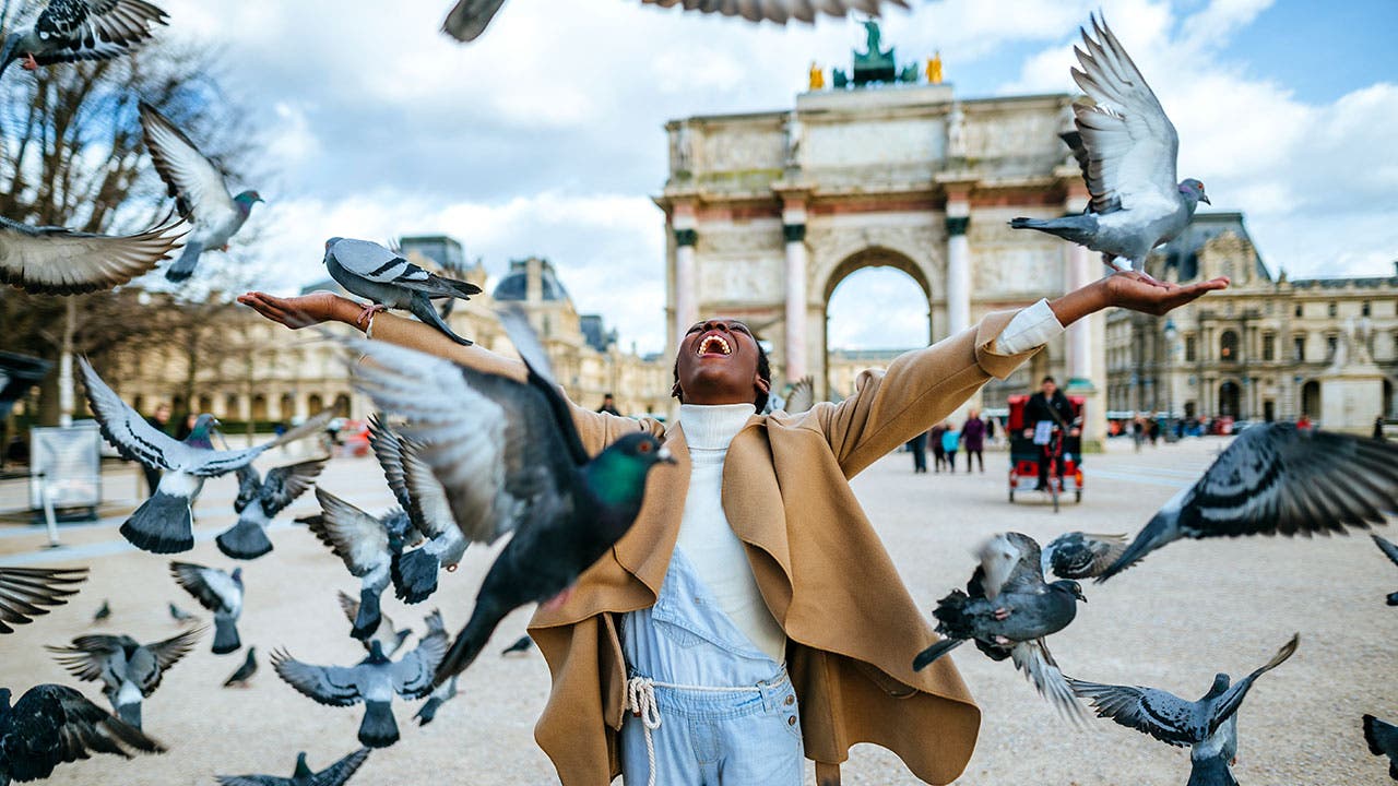 Woman at Arc de Triomphe
