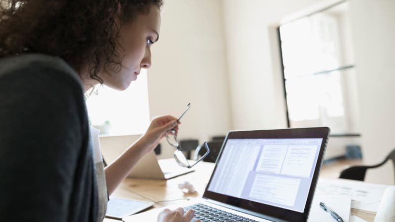 woman using laptop at work