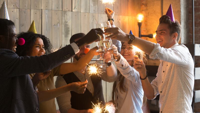 A group of friends toast to the new year
