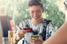 Person looking at credit card