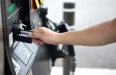 Person at gas pump