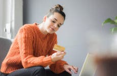 Person looking at credit card